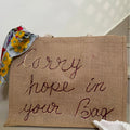 Carry Hope” Sustainable Jute Tote – Handcrafted with Inspirational Text